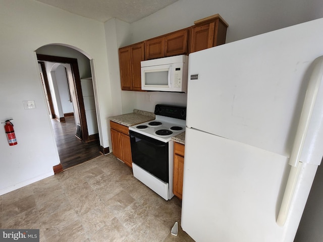 kitchen featuring white appliances