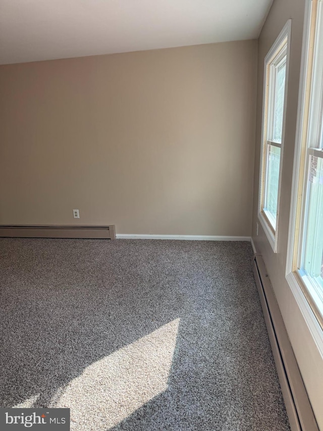 145 Press Ave, Browns Mills, NJ 08015 - carpeted spare room with a baseboard heating unit and baseboards