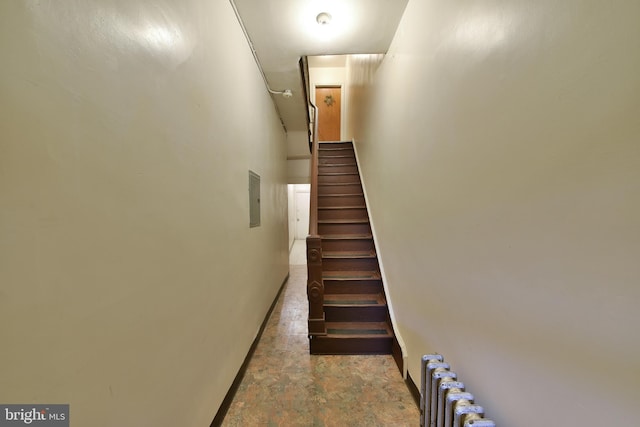 stairs featuring radiator heating unit