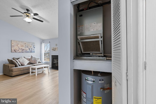 utility room featuring electric water heater