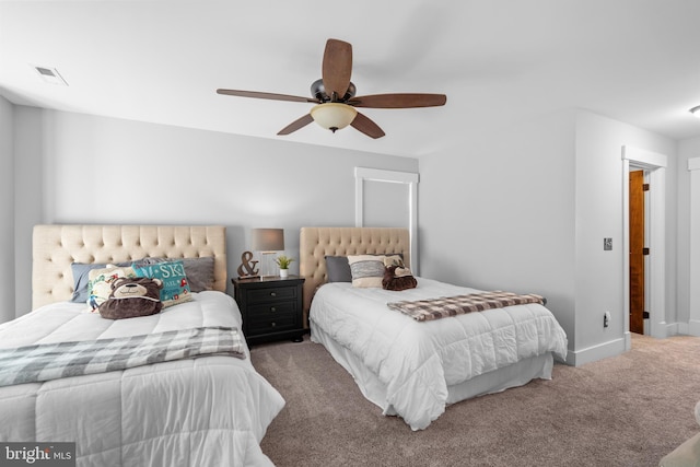 bedroom featuring ceiling fan and carpet flooring