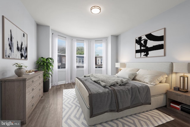 bedroom featuring dark hardwood / wood-style flooring