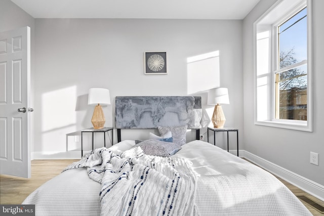 bedroom featuring light hardwood / wood-style flooring