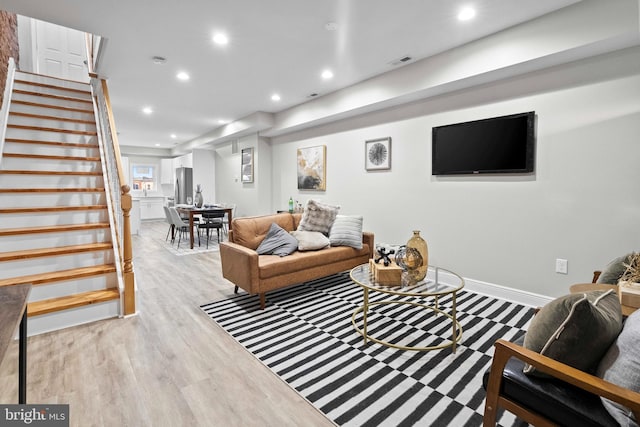 living room featuring light hardwood / wood-style flooring