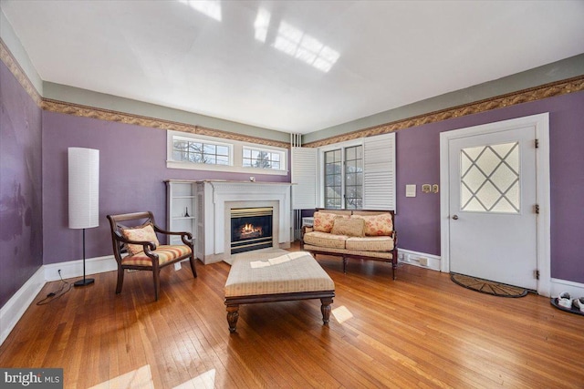 living room with light hardwood / wood-style flooring