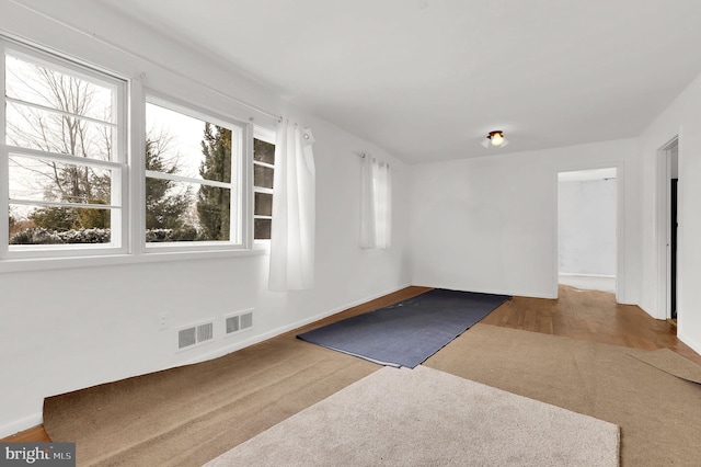 empty room with carpet flooring