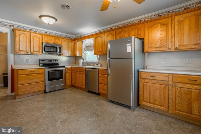 kitchen with stainless steel appliances and ceiling fan