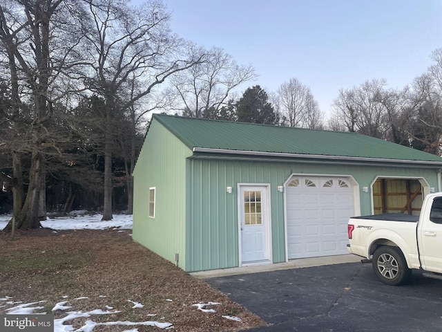 view of snow covered garage