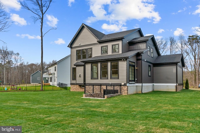 2003 Cornfield Creek Way, Pasadena, MD 21122 - rear view of house featuring a shingled roof