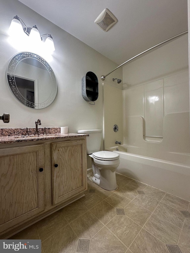 full bathroom with shower / bath combination, toilet, and vanity