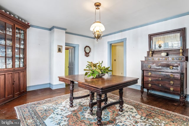 office featuring ornamental molding and dark hardwood / wood-style floors