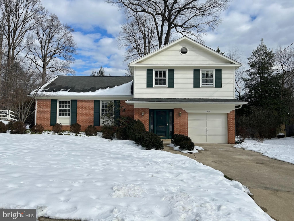 view of front of home with a garage