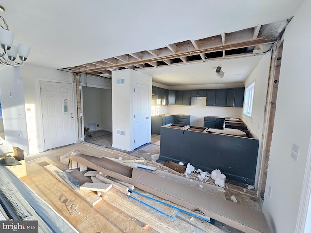 living area featuring visible vents