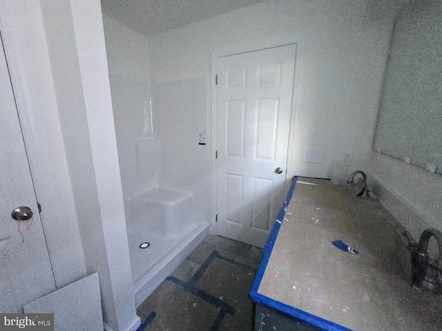 bathroom with walk in shower