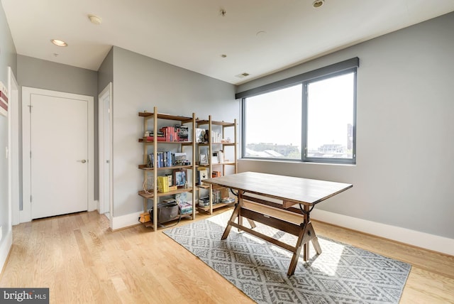 office space featuring light hardwood / wood-style floors