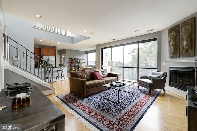 living room with light hardwood / wood-style floors