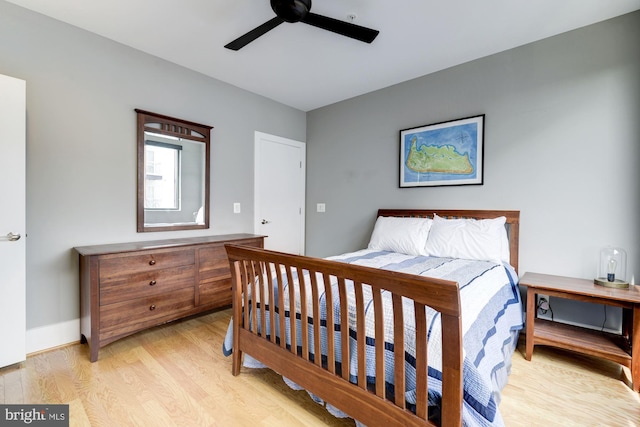 bedroom featuring ceiling fan and light hardwood / wood-style flooring