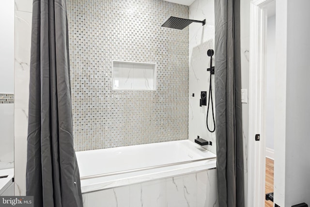 bathroom with shower / tub combo with curtain