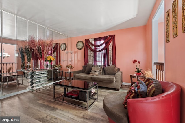 interior space with a chandelier and hardwood / wood-style flooring