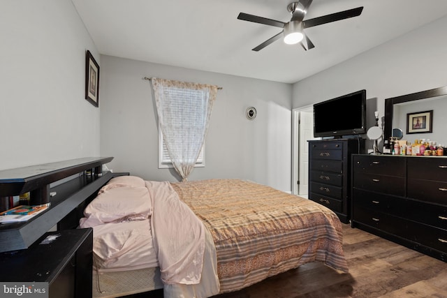 bedroom with ceiling fan and light hardwood / wood-style floors