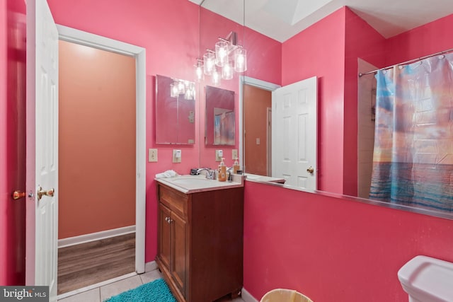 bathroom with vanity, tile patterned flooring, and a shower with shower curtain