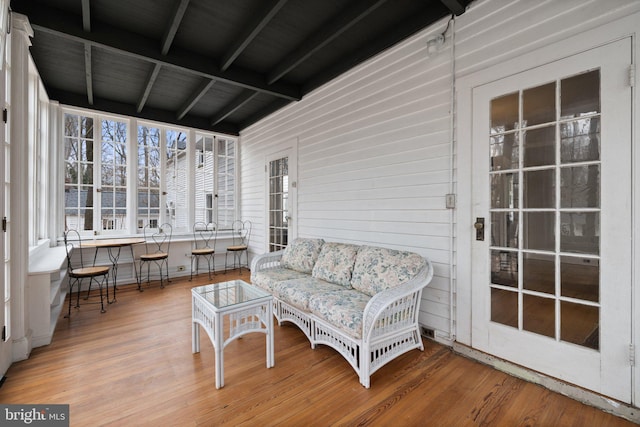 sunroom / solarium with beam ceiling