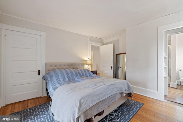 bedroom featuring wood-type flooring