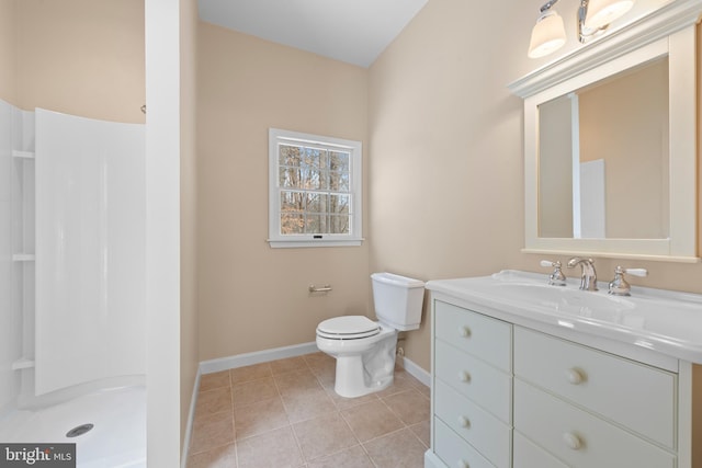 bathroom with vanity, toilet, a shower, and tile patterned flooring