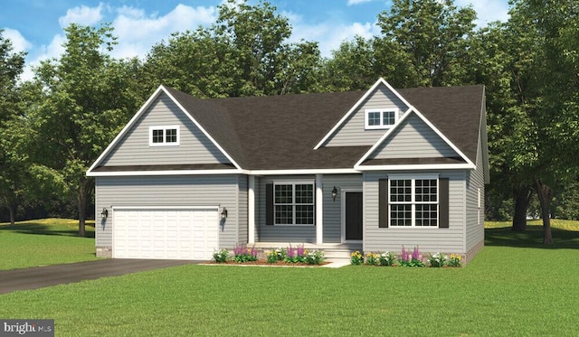 view of front of home with a front lawn and a garage