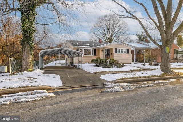 view of front of house with a carport