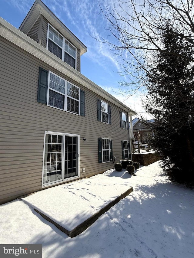 view of snow covered property