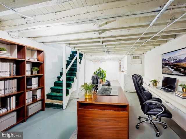 office space with concrete floors