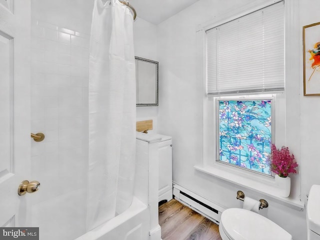 bathroom featuring toilet, shower / tub combo, baseboard heating, and hardwood / wood-style flooring