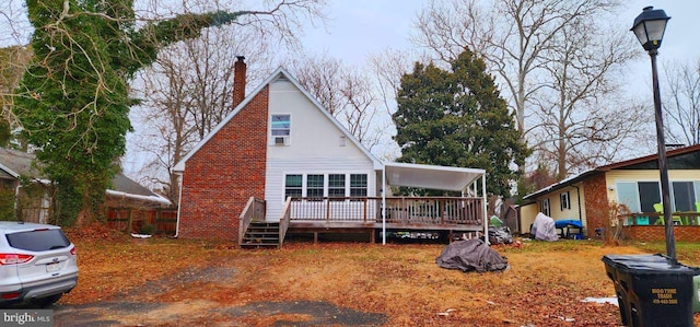 view of front of house with a wooden deck