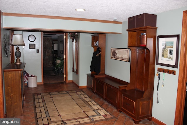 interior space featuring a textured ceiling