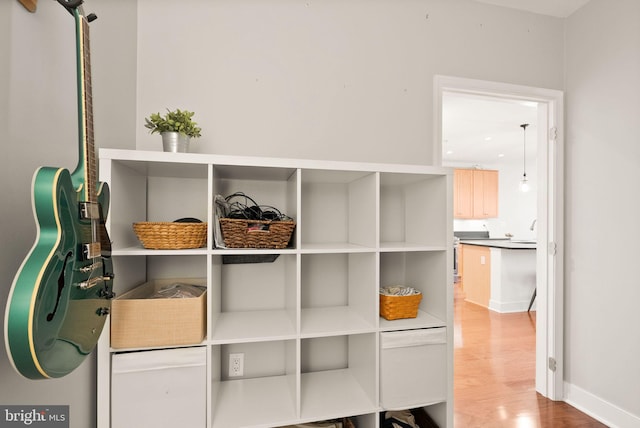 interior details featuring hardwood / wood-style flooring