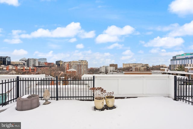 view of snow covered patio