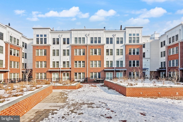 view of snow covered property