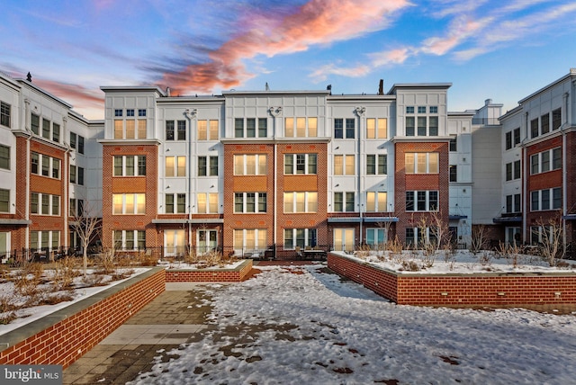 view of snow covered property