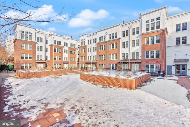 view of snow covered property