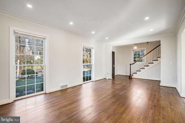 unfurnished living room with crown molding and dark hardwood / wood-style flooring