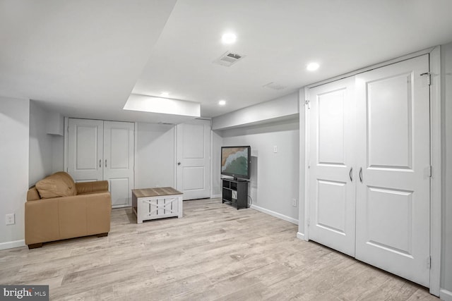 living area featuring light hardwood / wood-style floors