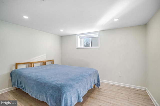 bedroom featuring light hardwood / wood-style floors