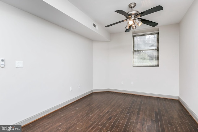 unfurnished room featuring ceiling fan and dark hardwood / wood-style flooring