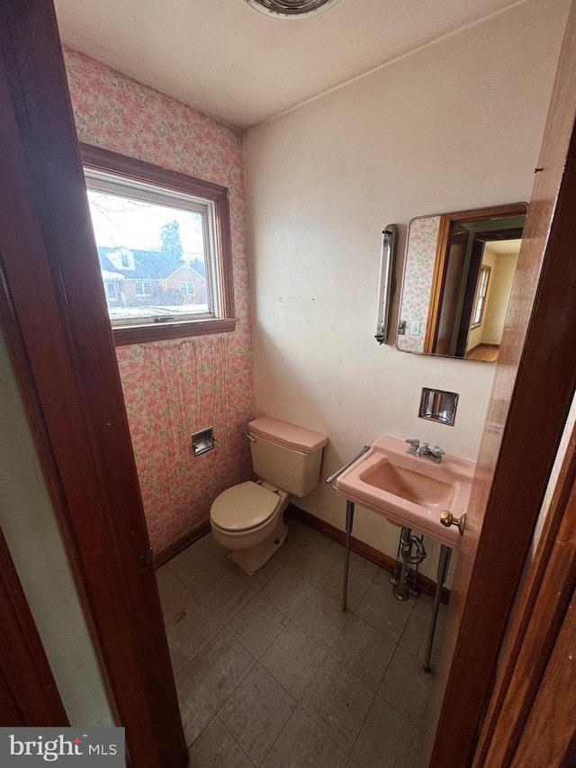 bathroom with sink and toilet