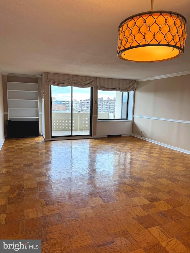 spare room featuring parquet floors