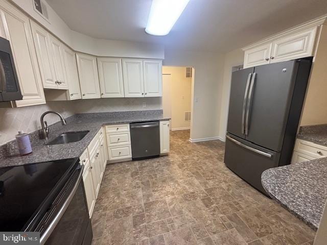 kitchen with white cabinets, sink, and black appliances