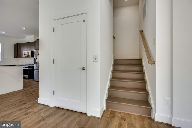 3234 Royal Fern Pl, Rockville, MD 20852 - stairs featuring visible vents, baseboards, recessed lighting, and wood finished floors