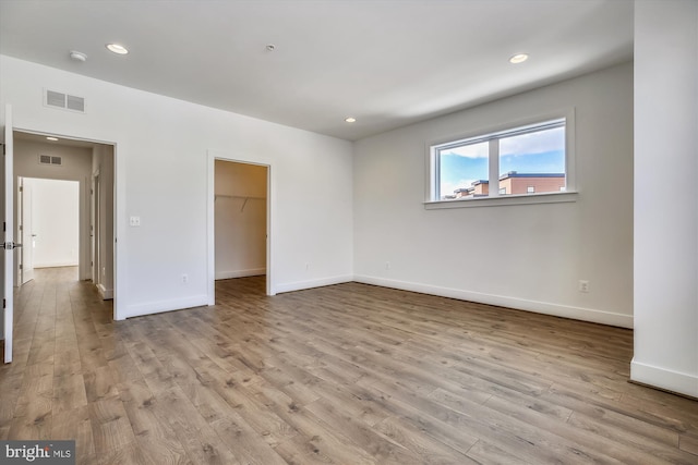 3234 Royal Fern Pl, Rockville, MD 20852 - spare room with baseboards, visible vents, recessed lighting, and wood finished floors