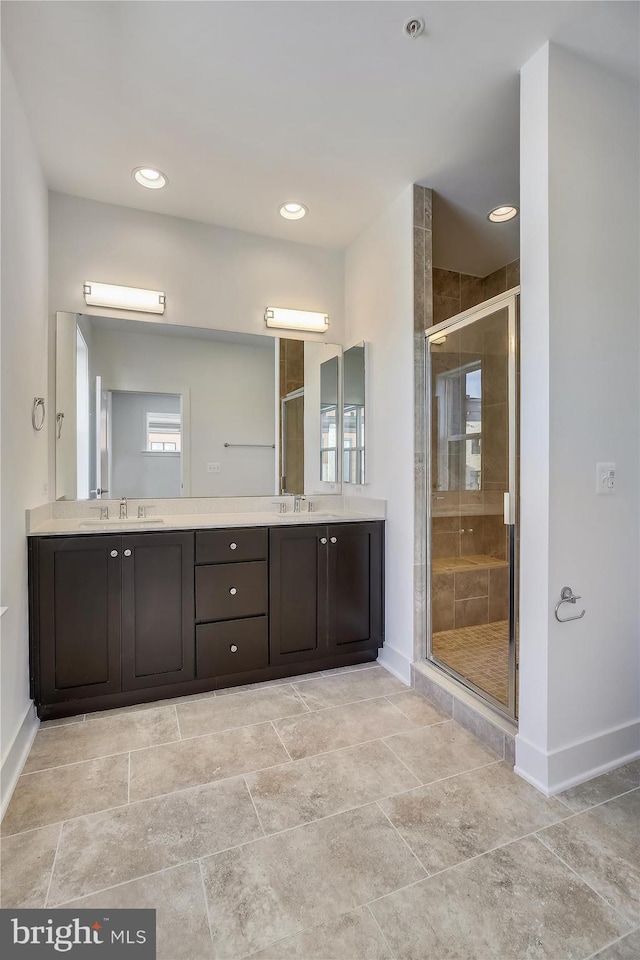 3234 Royal Fern Pl, Rockville, MD 20852 - full bath with a sink, a shower stall, double vanity, baseboards, and recessed lighting
